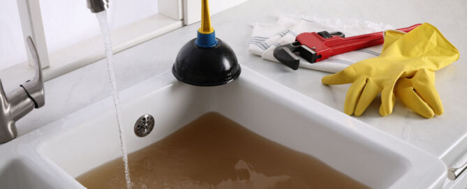 standing water in clogged drain